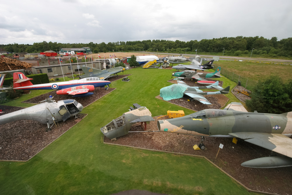 A photo of Dumfries and Galloway Aviation Museum, a must-visit attraction for aviation enthusiasts, featuring a collection of aircraft and exhibits on the history of aviation in the region.